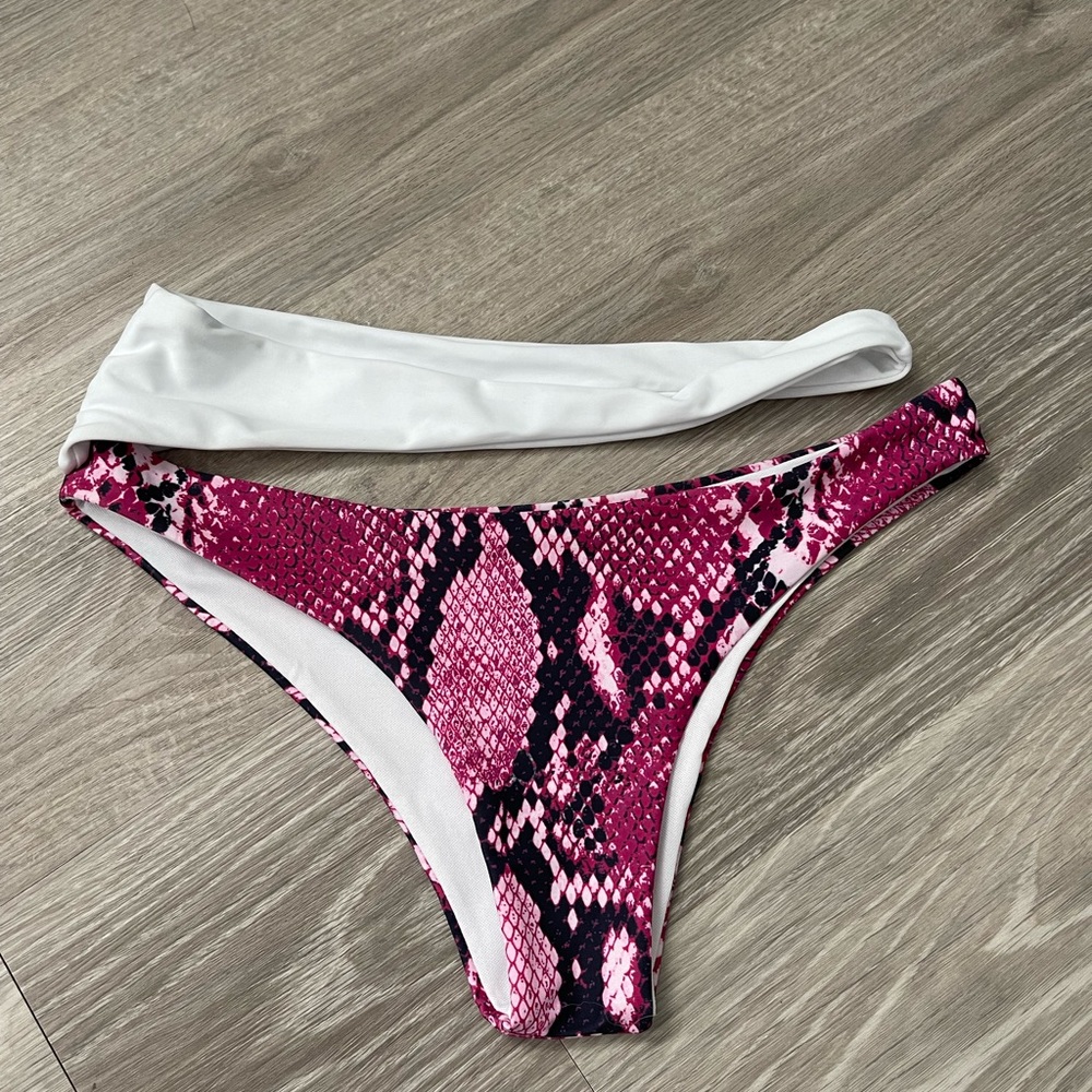bathing suit bottoms snake print and white strap never worn brand new
